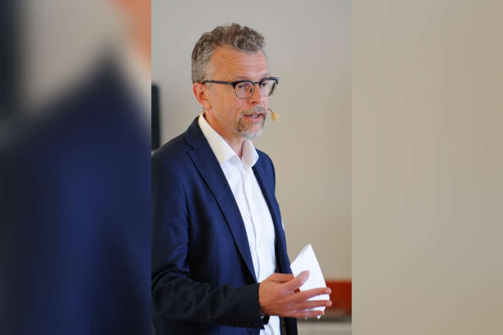 Graue Container, grüner Gewinn 1